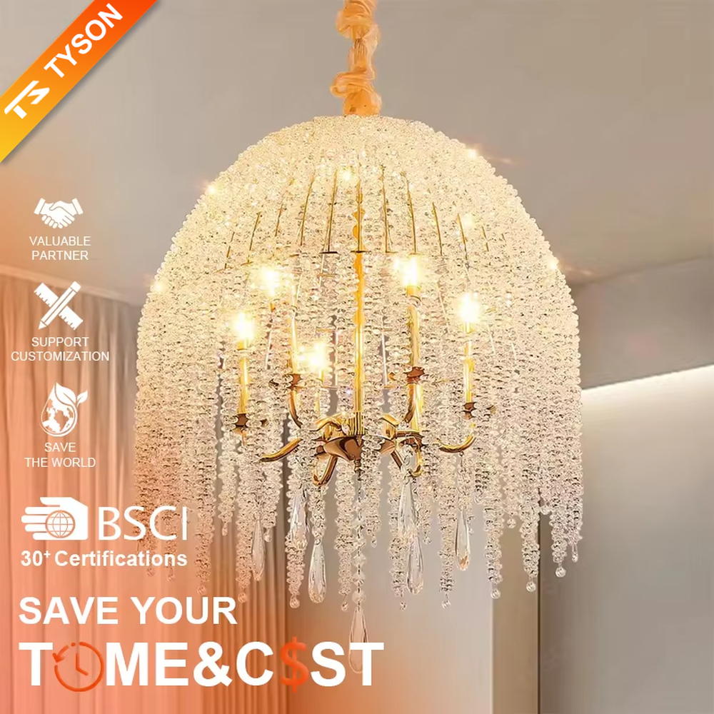 This is a luxury crystal chandelier with a golden base and cascading crystal string design, featuring a luxurious and elegant style that shows brilliant texture under light. It is used for space lighting and decoration, creating a noble and luxurious ambiance. It is suitable for luxury-style home living rooms, high-end hotel guest rooms, luxury restaurants and other places.