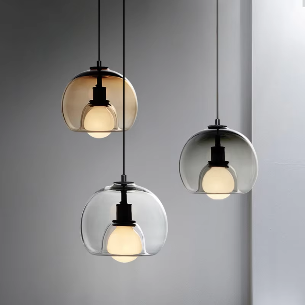 Modern minimalist dark green glass hemisphere chandelier, warm light effect, creating a high-quality minimalist space atmosphere.