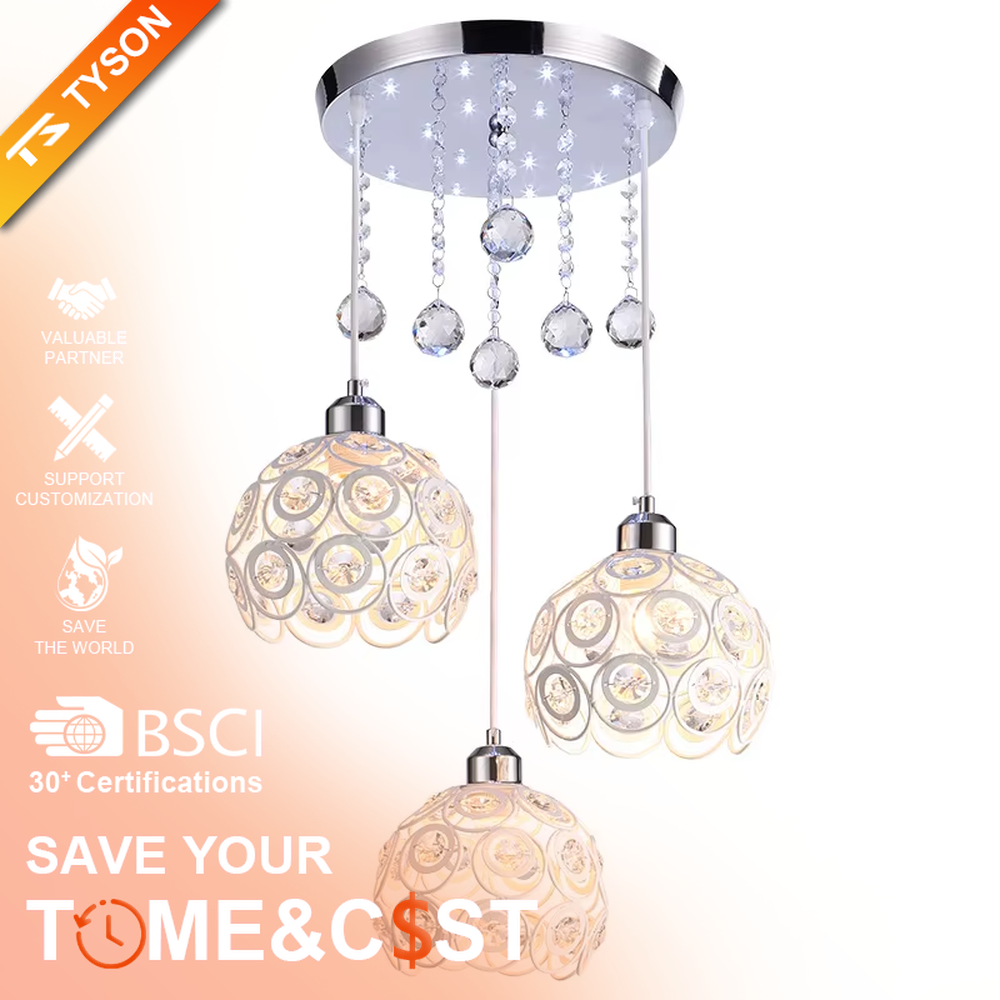 This light luxury three-head dining chandelier features a black metal top frame, paired with silver suspension rods and hollow black-gold spherical lampshades (embedded with crystal accents), with an exquisite and brilliant shape, serving both lighting and decorative purposes, ideal for dining rooms, bars, light luxury homes and other scenarios.