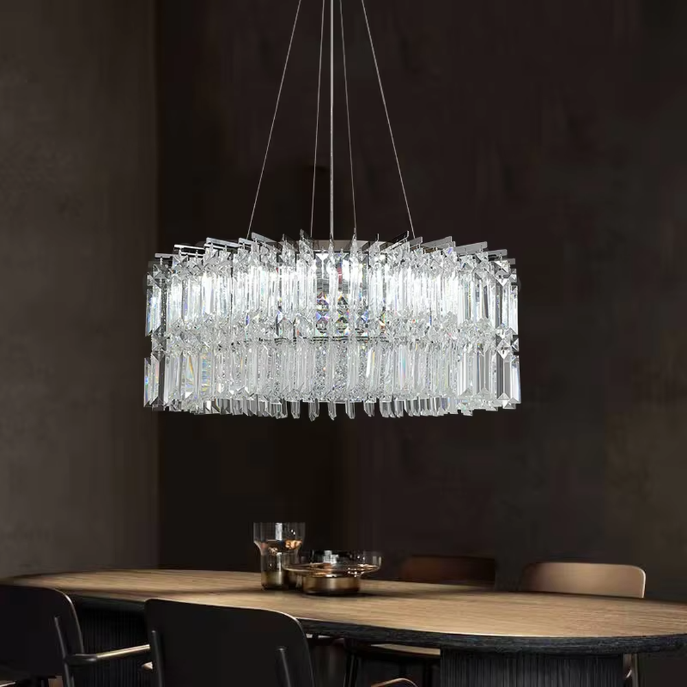 Luxury rectangular crystal chandelier (multi-faceted cut crystals + polished metal), warm light effect, creating a brilliant and high-end light luxury space atmosphere.