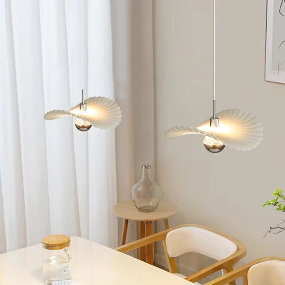 Modern minimalist wing-shaped white shade + silver ball multi-head pendant light, warm light effect, creating a fresh and natural space atmosphere.