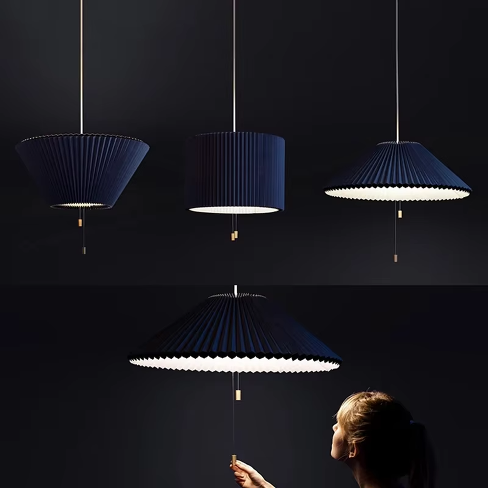 This modern minimalist fan-shaped chandelier features a light lake blue pleated fabric lampshade with a black edge, in an umbrella-shaped suspended style, serving both lighting and decorative purposes, ideal for modern minimalist spaces such as dining rooms, living rooms, and wabi-sabi cafes.