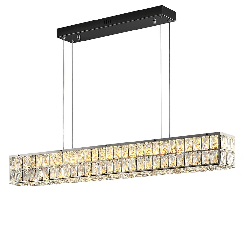 Modern light luxury silver frame long strip full-cut crystal chandelier, warm light effect, creating an exquisite luxurious dining atmosphere.