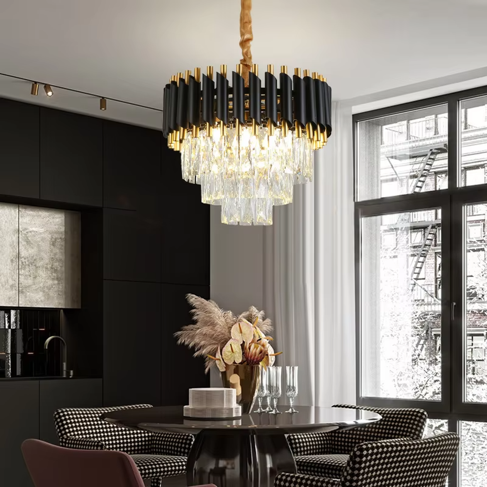 This is a luxury black-gold crystal chandelier, with black-gold metal columns and multi-layer transparent crystals, featuring a modern luxury design with brilliant and grand lighting. It is used for space lighting and decoration, creating a high-end luxury atmosphere. It is suitable for luxury-style home living rooms, high-end restaurants, luxury clubs and other places.