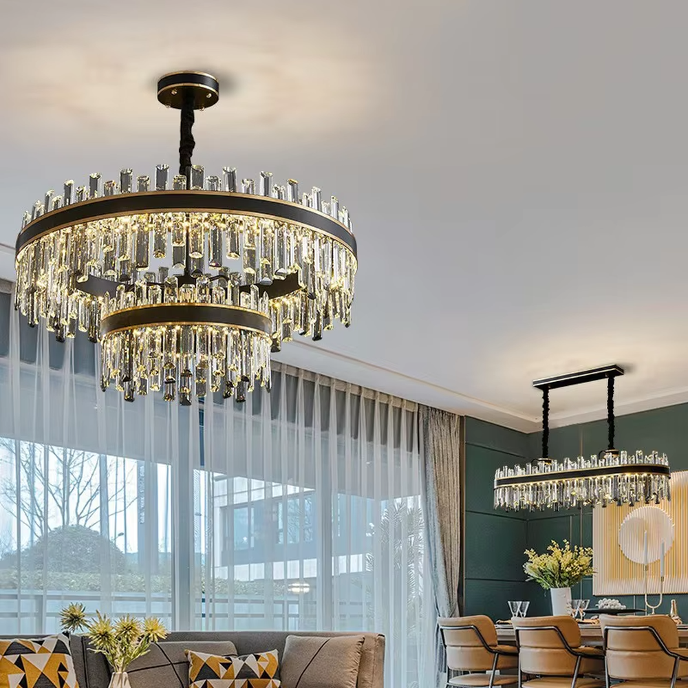 This is a light luxury modern-style black and gold rectangular crystal chandelier, with a black and gold metal frame, paired with numerous transparent crystal columns and black woven hanging ropes. It features a light luxury and grand design, with brilliant lighting. It is used for space lighting and decoration, creating a light luxury and high-end atmosphere. Suitable for light luxury-style restaurants, modern minimalist living rooms, high-end hotel dining areas and other places.