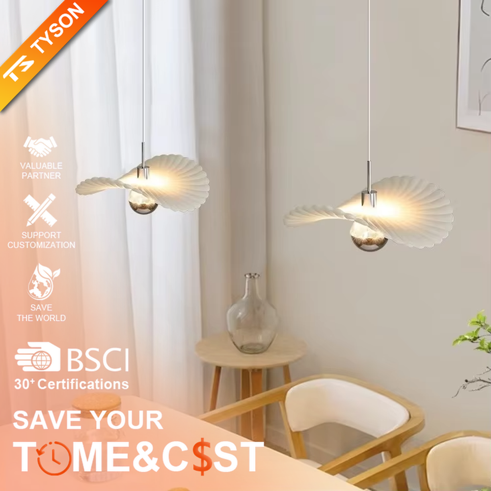 Modern minimalist wing-shaped white shade + silver ball multi-head pendant light, warm light effect, creating a fresh and natural space atmosphere.