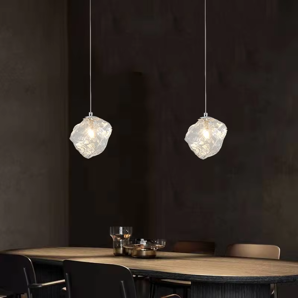 Art crystal stone glass chandelier (irregular crystal stone texture glass shade + metal hanging rod), warm light effect, creating a high-end artistic space atmosphere.