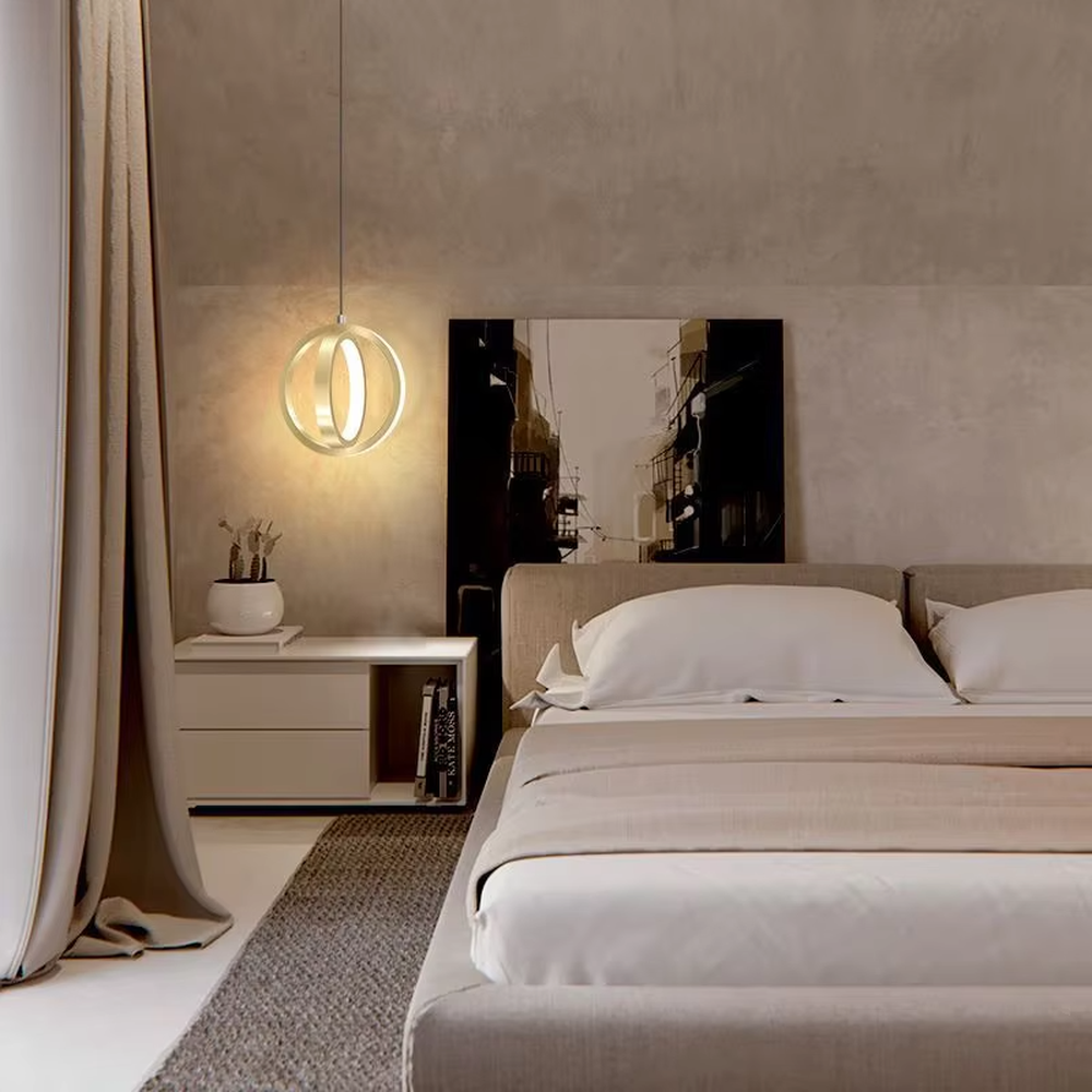 Light luxury double-ring staggered wall lamp (gold metal ring + built-in light strip), warm light effect, creating a stylish and high-end bedroom atmosphere.