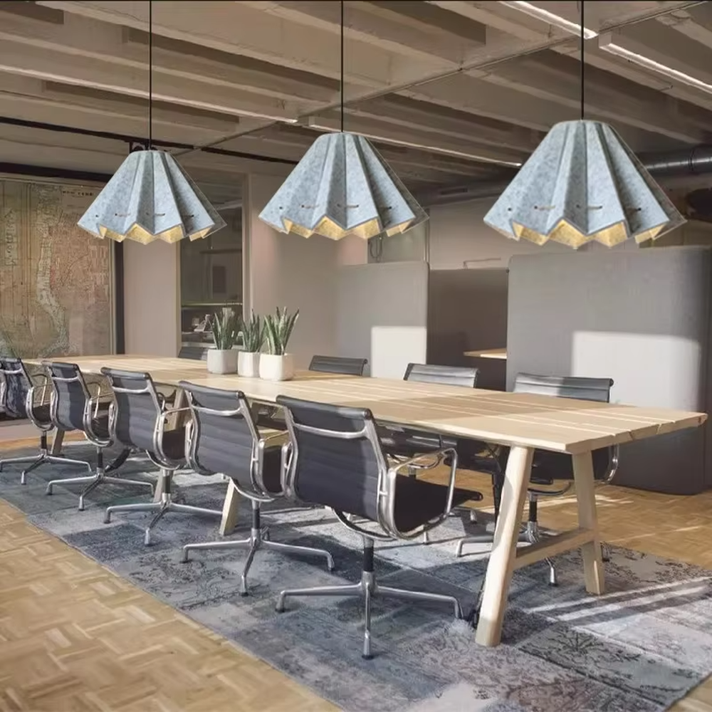 This is a modern artistic dark blue spliced origami chandelier, with a geometric origami structure, outer dark blue material and inner wood texture, featuring strong artistic sense and modern style. It is used for space lighting and decoration, creating an artistic and modern atmosphere. It is suitable for modern art home living rooms, designer studios, high-end creative restaurants and other places.