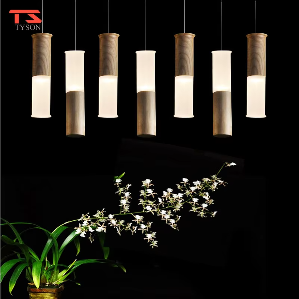 Natural minimalist wood and frosted glass cylinder multi-head pendant light, warm light effect, creating a natural cozy atmosphere.
