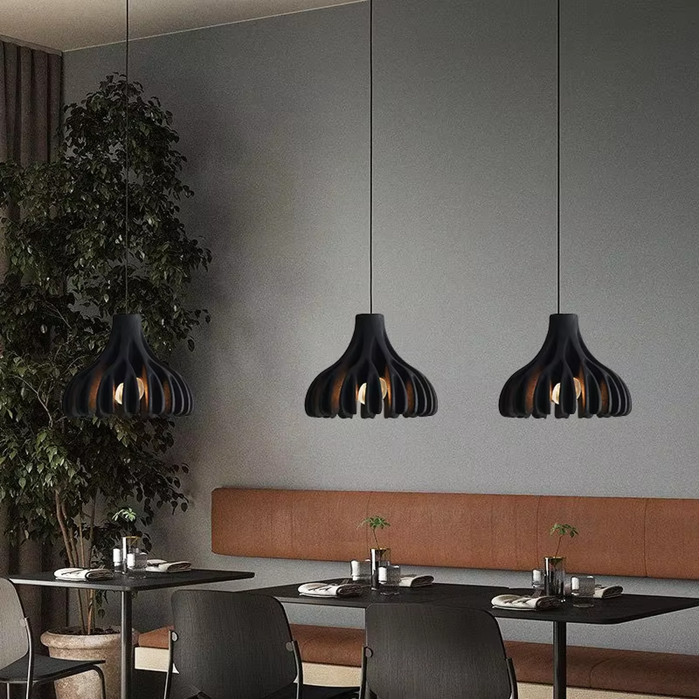 Fresh bud-folded shape multi-color hanging chandelier, bright colors like yellow/green + fan-folded lampshade + black suspension rope, soft warm light, creating a lively and fresh home atmosphere.