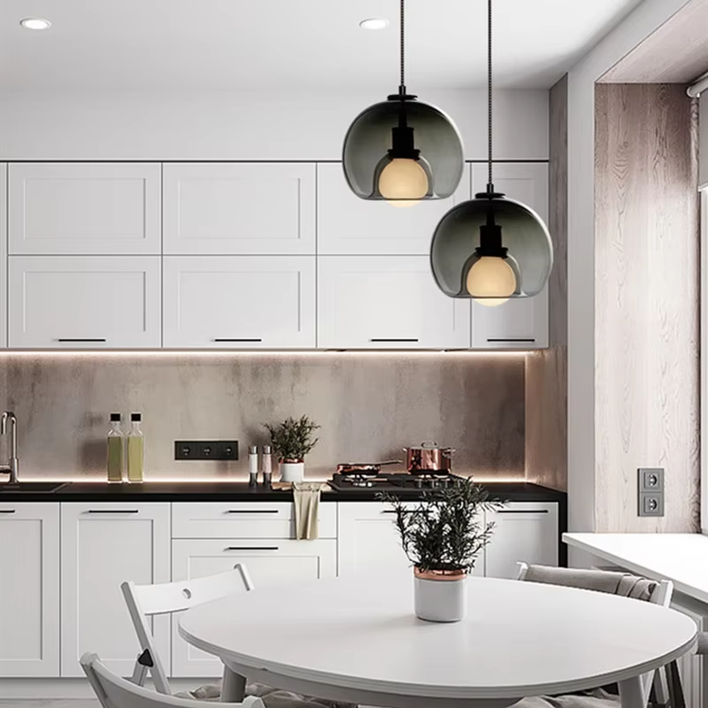 Modern minimalist dark green glass hemisphere chandelier, warm light effect, creating a high-quality minimalist space atmosphere.