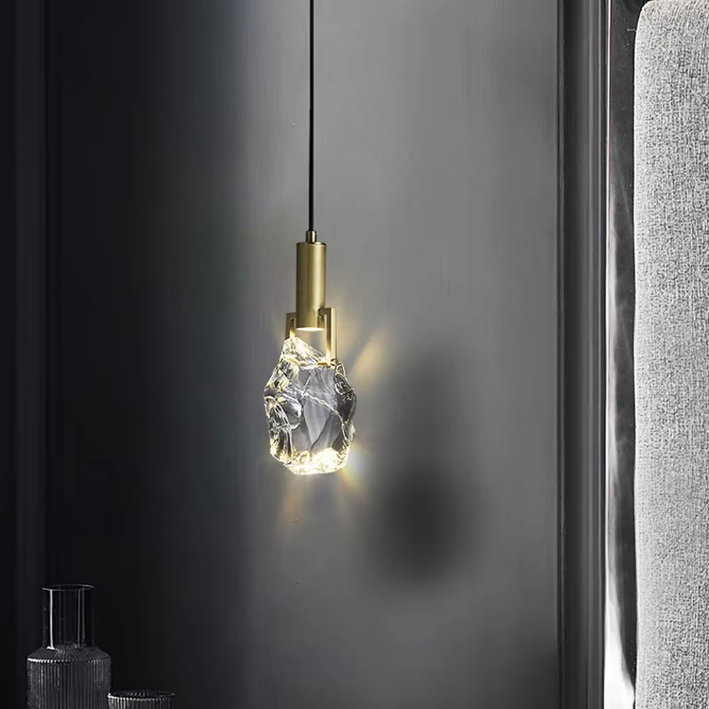 Light luxury gold-decor water-drop glass hanging lamp, golden metal trim + transparent water-drop glass main body, warm light with soft halo, creating a high-end artistic light luxury atmosphere.