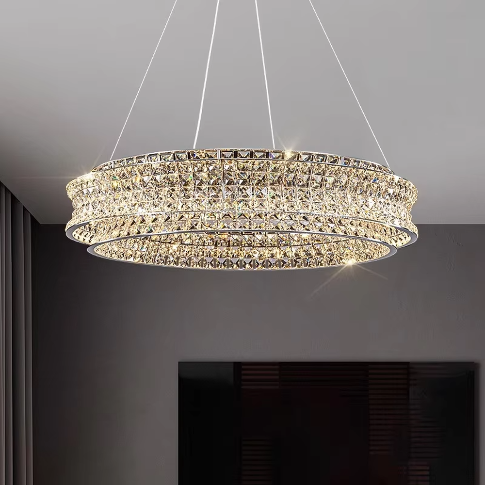 This is a light luxury and luxurious double-layer ring crystal chandelier, with a double-layer ring shape full of crystals. When lit, the light is brilliant and gorgeous, creating a high-end luxurious atmosphere.