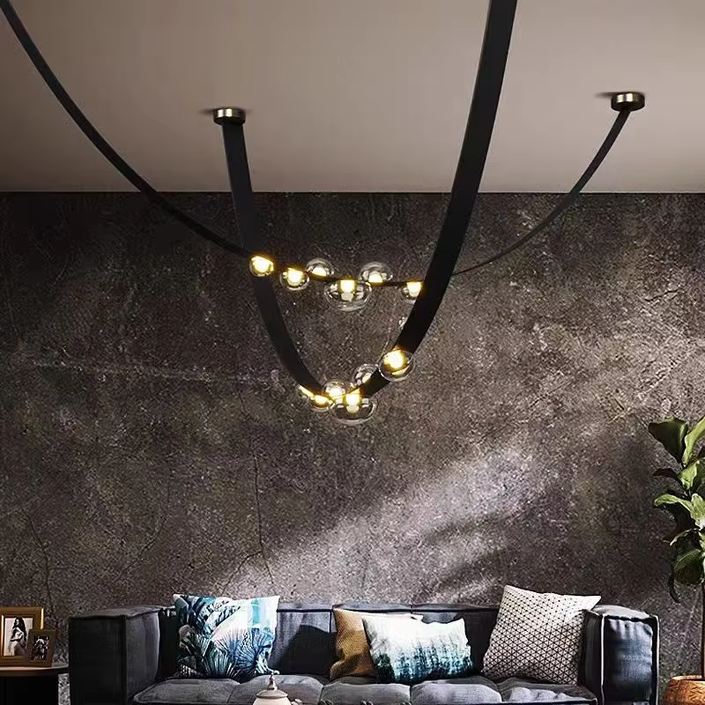 Modern creative curved black frame smoked glass ball chandelier, black curved metal bracket + multiple smoked glass spherical lampshades, soft and high-end lighting, creating a minimalist artistic atmosphere.
