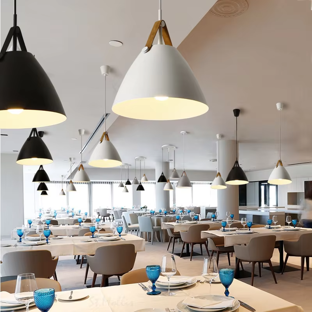 This set of Nordic-style glass lighting includes a table lamp and a chandelier, with drum-shaped lampshades made of blue-gray gradient glass. The table lamp is paired with a black tripod base, and the chandelier uses a suspension design, emitting soft and transparent light, serving both lighting and decorative purposes, ideal for bedrooms, dining rooms, Nordic-style homes and internet-famous shops and other scenarios.