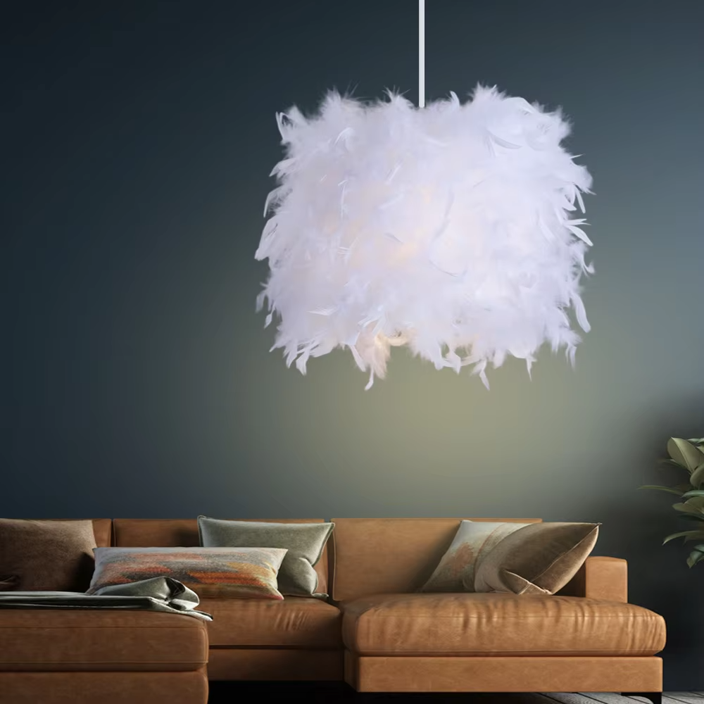 Dreamy feather spherical chandelier (pure white feather lampshade + thin hanging wire), warm light effect, creating a soft and healing space atmosphere.