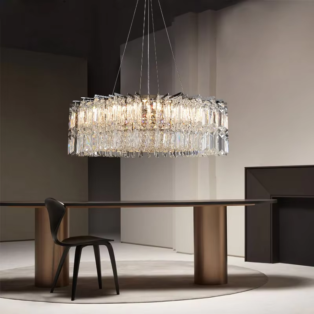Luxury rectangular crystal chandelier (multi-faceted cut crystals + polished metal), warm light effect, creating a brilliant and high-end light luxury space atmosphere.