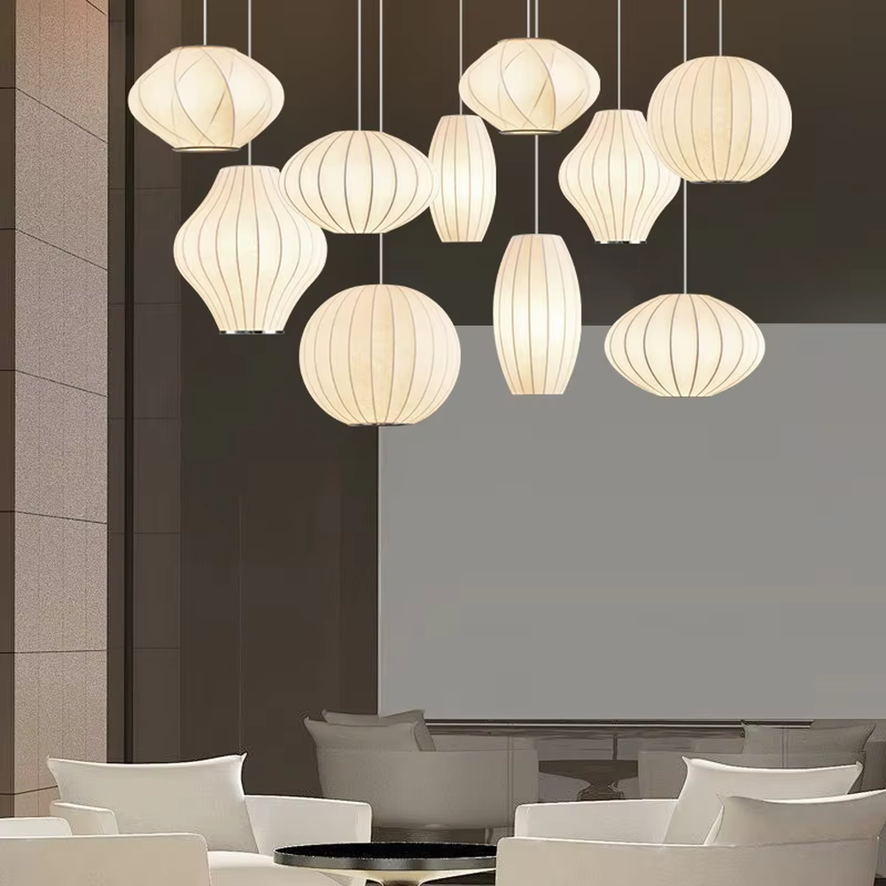 Japanese minimalist style multi-shape beige striped fabric lampshade track multi-head pendant light, warm light effect, creating a soft and cozy space atmosphere.