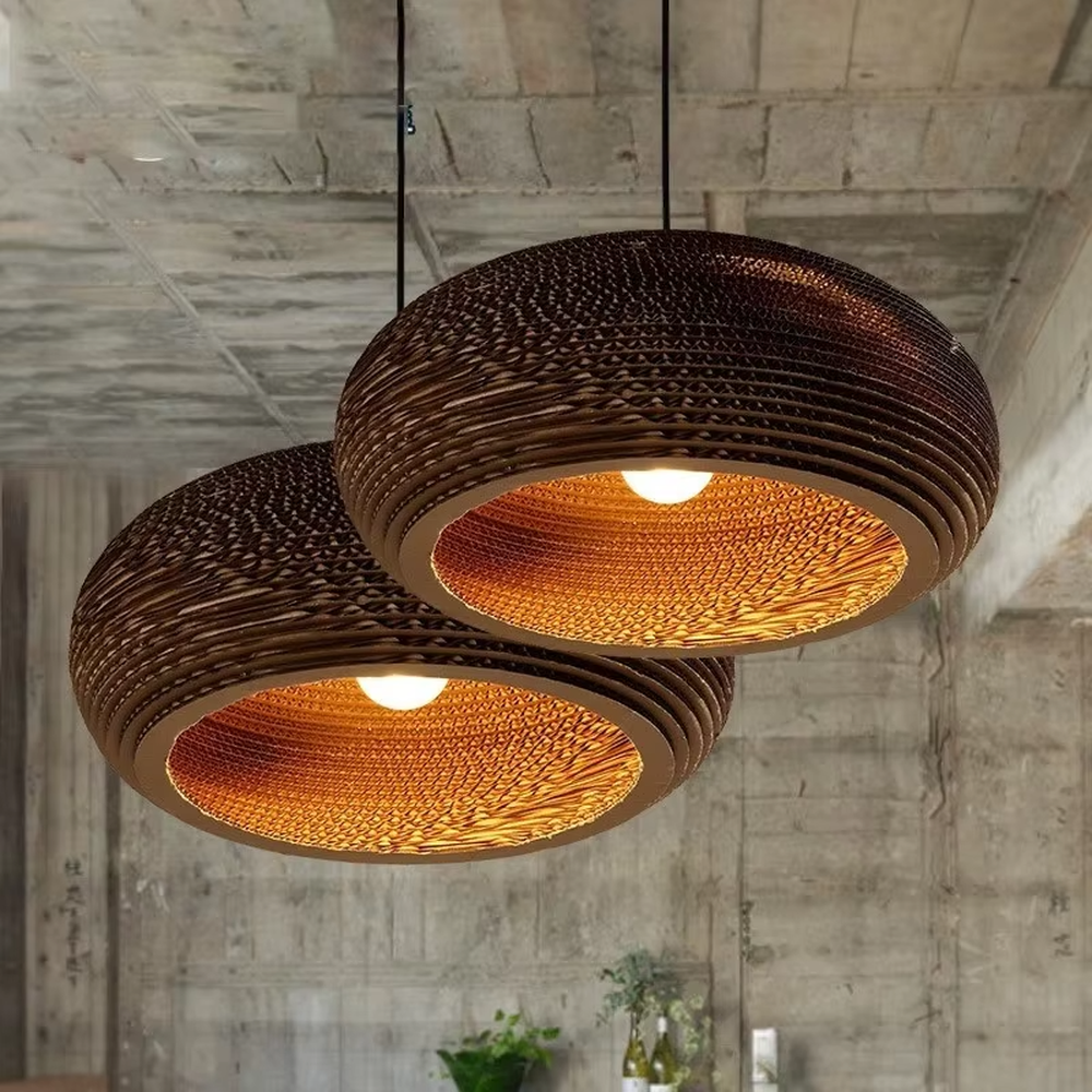 This is a set of natural artistic paper chandeliers, featuring various geometric shapes made of corrugated paper with brown textures, simple and natural, and artistic in design. It is used for space lighting and decoration, creating a natural and artistic atmosphere. It is suitable for Nordic-style home dining rooms, creative cafes, art studios and other places.