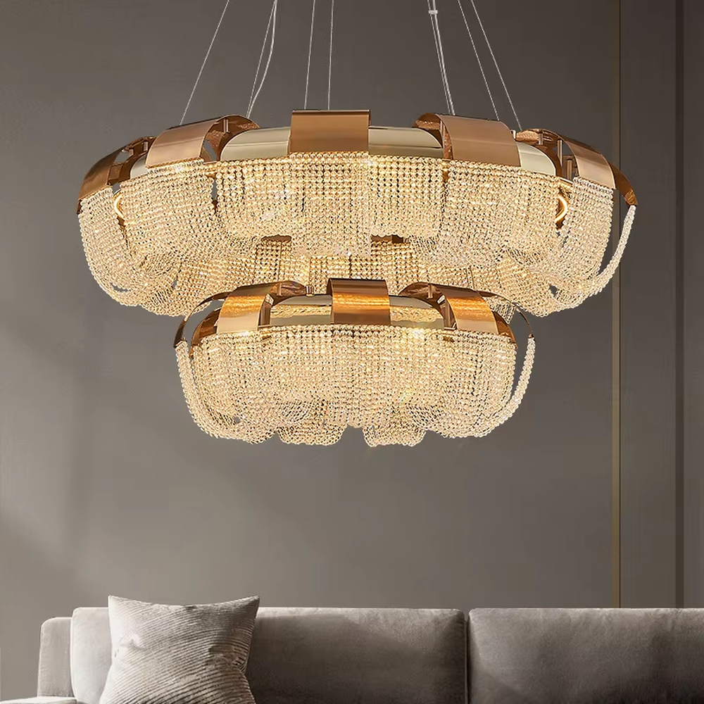 Light luxury modern golden frame crystal winding chandelier, ring-shaped crystal string design + warm light bulbs, creating a flexible luxurious atmosphere.