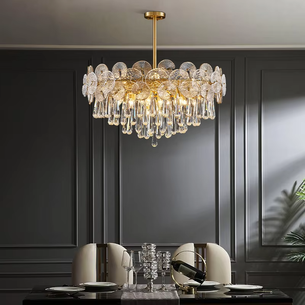 This is a light luxury and luxurious disc crystal chandelier, with a golden metal frame paired with multi-layer disc-shaped crystals and crystal pendants. It features an exquisite and grand design, with brilliant and soft lighting. It is used for space lighting and decoration, creating a light luxury and luxurious atmosphere. Suitable for light luxury-style dining rooms, luxury living rooms, high-end hotel banquet halls and other places.
