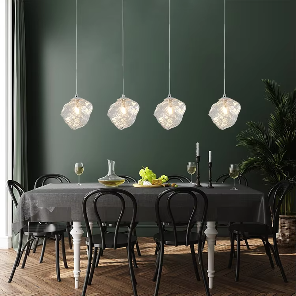 Art crystal stone glass chandelier (irregular crystal stone texture glass shade + metal hanging rod), warm light effect, creating a high-end artistic space atmosphere.