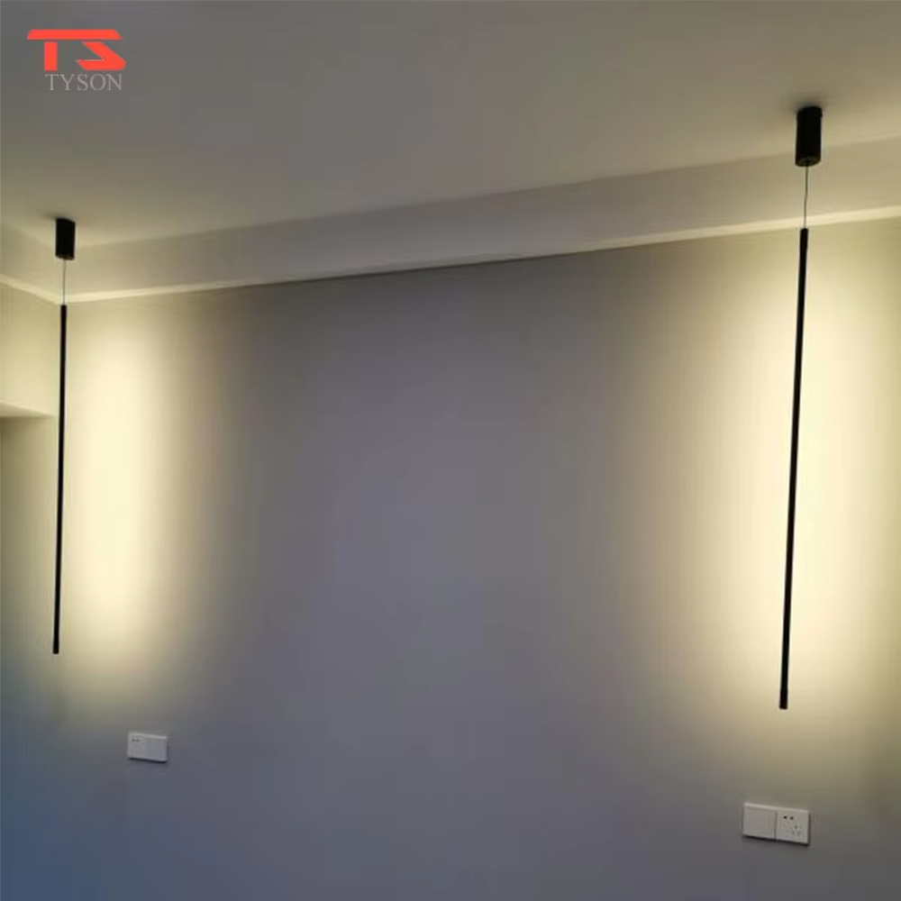 Minimalist black linear LED chandelier, with a long strip suspended design, soft and even light, used for lighting and decoration in dining tables, bars and other areas, suitable for modern minimalist, minimalist style home and commercial spaces
