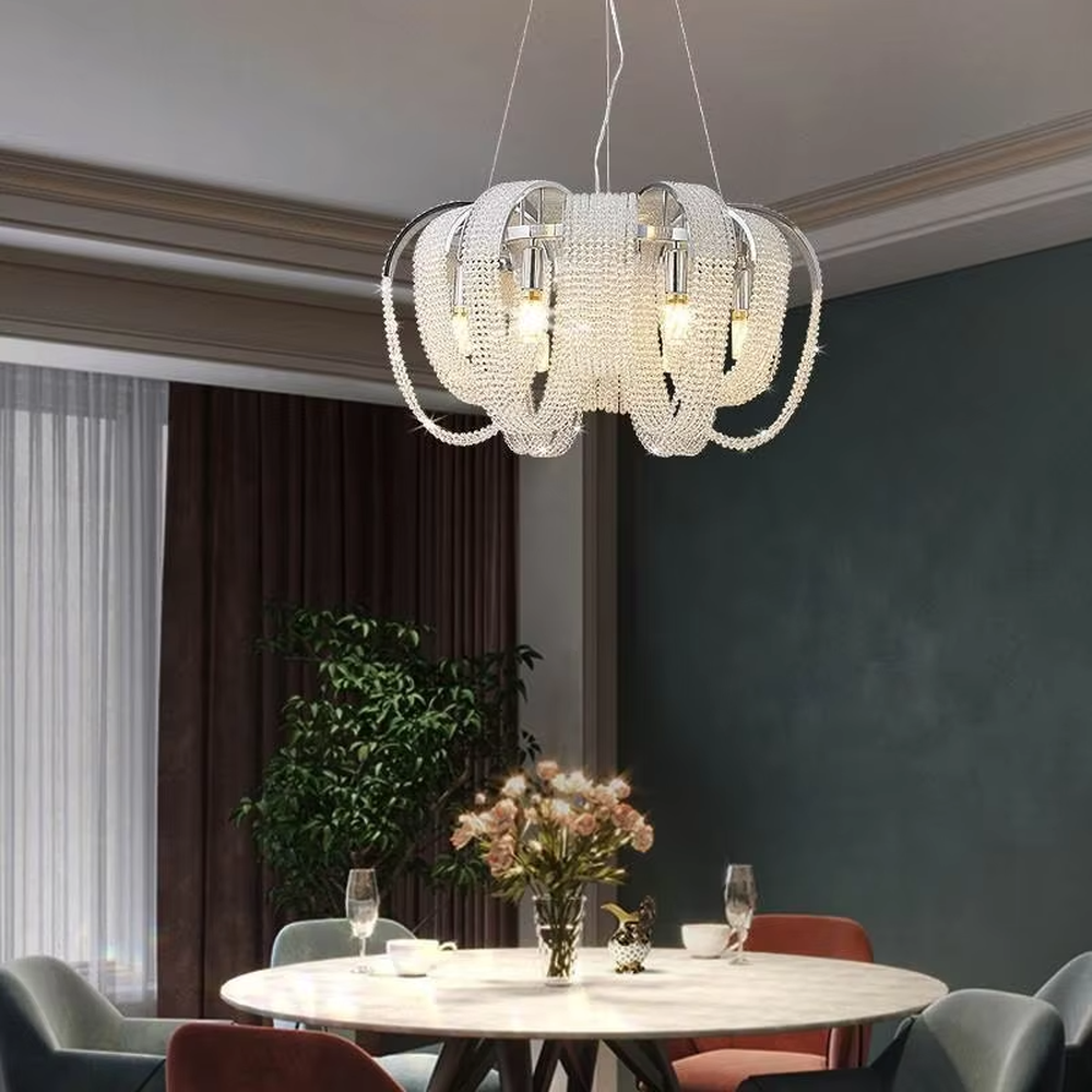 Light luxury golden frame pearl string bud-shaped chandelier, warm light effect, creating an exquisite and soft space atmosphere.