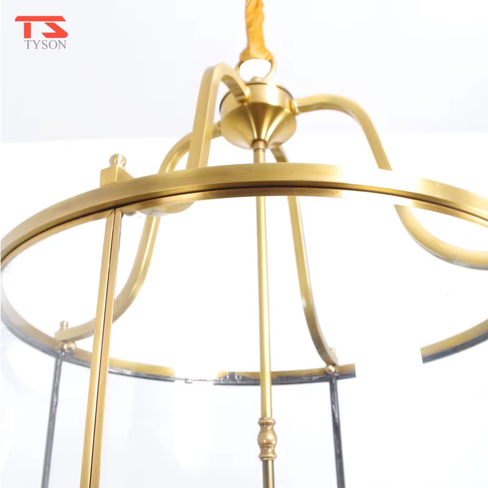 Light luxury golden metal cage-style glass cover candelabra chandelier, golden frame + transparent cylindrical glass cover + candle-shaped bulbs, soft warm light, creating a vintage light luxury atmosphere.