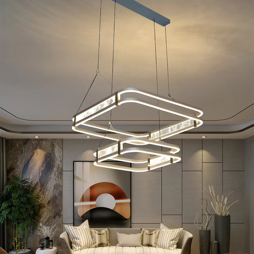 This is a modern artistic golden crossed ring chandelier, with a golden metal crossed ring structure and embedded crystal elements, featuring a minimalist and grand design, brilliant lighting. It is used for space lighting and decoration, creating a modern luxurious atmosphere. Suitable for modern minimalist living rooms, high-end creative restaurants, designer studios and other places.