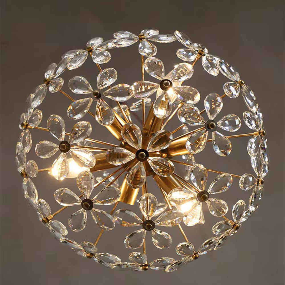 A French light luxury style double-layer crystal petal chandelier, featuring a gold iron frame inlaid with K9 crystal petal decorations. It emits a brilliant and soft glow when lit, combining decorative appeal with practical illumination, ideal for creating a romantic and retro space atmosphere.