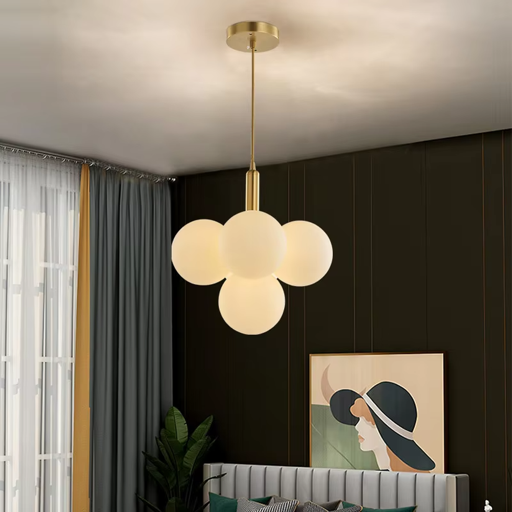 Modern light luxury cloud-shaped chandelier, with a golden metal frame and milky white frosted glass ball lampshades stacked into a full cloud shape, featuring soft and warm light, combining decorative and lighting functions, suitable for living rooms, dining rooms, bedrooms and other modern style spaces.