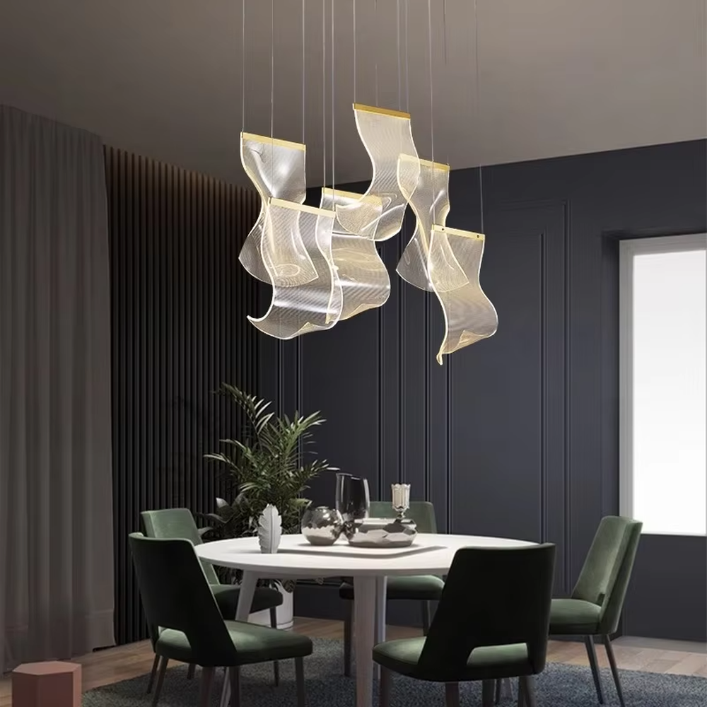 A modern light luxury style layered art chandelier, featuring irregularly folded transparent glass panels suspended by thin wires, with gold trim on the edges. It emits a soft and transparent glow when lit, combining decorative appeal with practical illumination, ideal for creating a high-end and dreamy space atmosphere.
