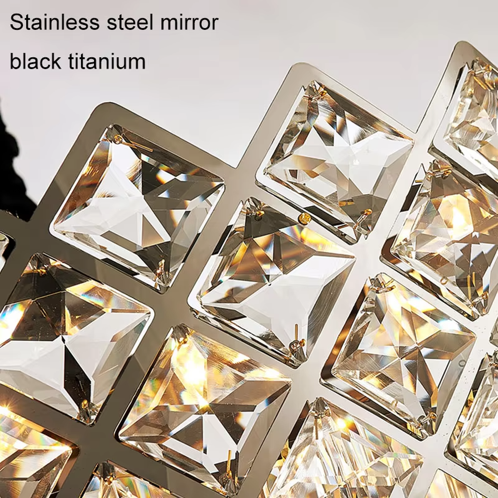 This light luxury rectangular crystal chandelier features a metal frame paired with a rhombus-faceted crystal border and drooping crystal tassels, with light refracting a brilliant halo through the crystals, serving both lighting and decorative purposes, suitable for modern light luxury spaces such as dining rooms and living rooms.