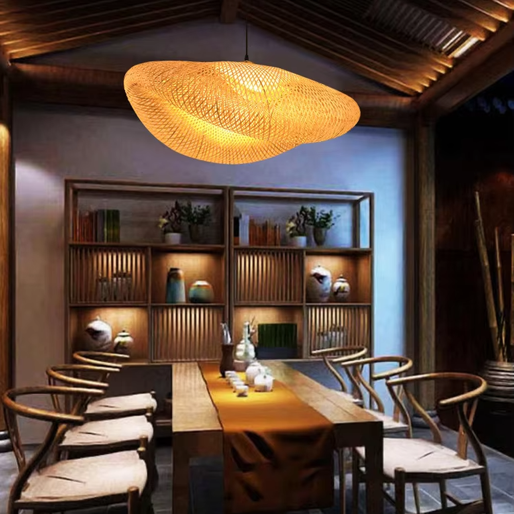 This wabi-sabi style hand-woven rattan cloud chandelier is made of natural rattan woven into an irregular UFO shape. Warm light passes through the woven texture to emit a soft and transparent halo, combining natural texture and artistic atmosphere, suitable for lighting and decoration in natural style spaces such as restaurants and tea rooms.