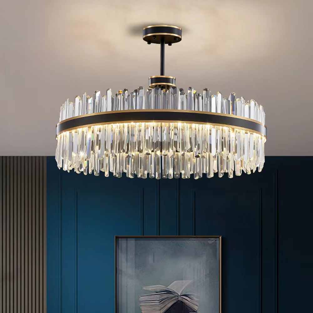 Modern light luxury double-layer ring crystal chandelier, with a golden metal frame and layered transparent crystal strips hanging down, featuring bright and soft light, combining decorative and lighting functions, suitable for living rooms, dining rooms, villas and other light luxury style spaces.
