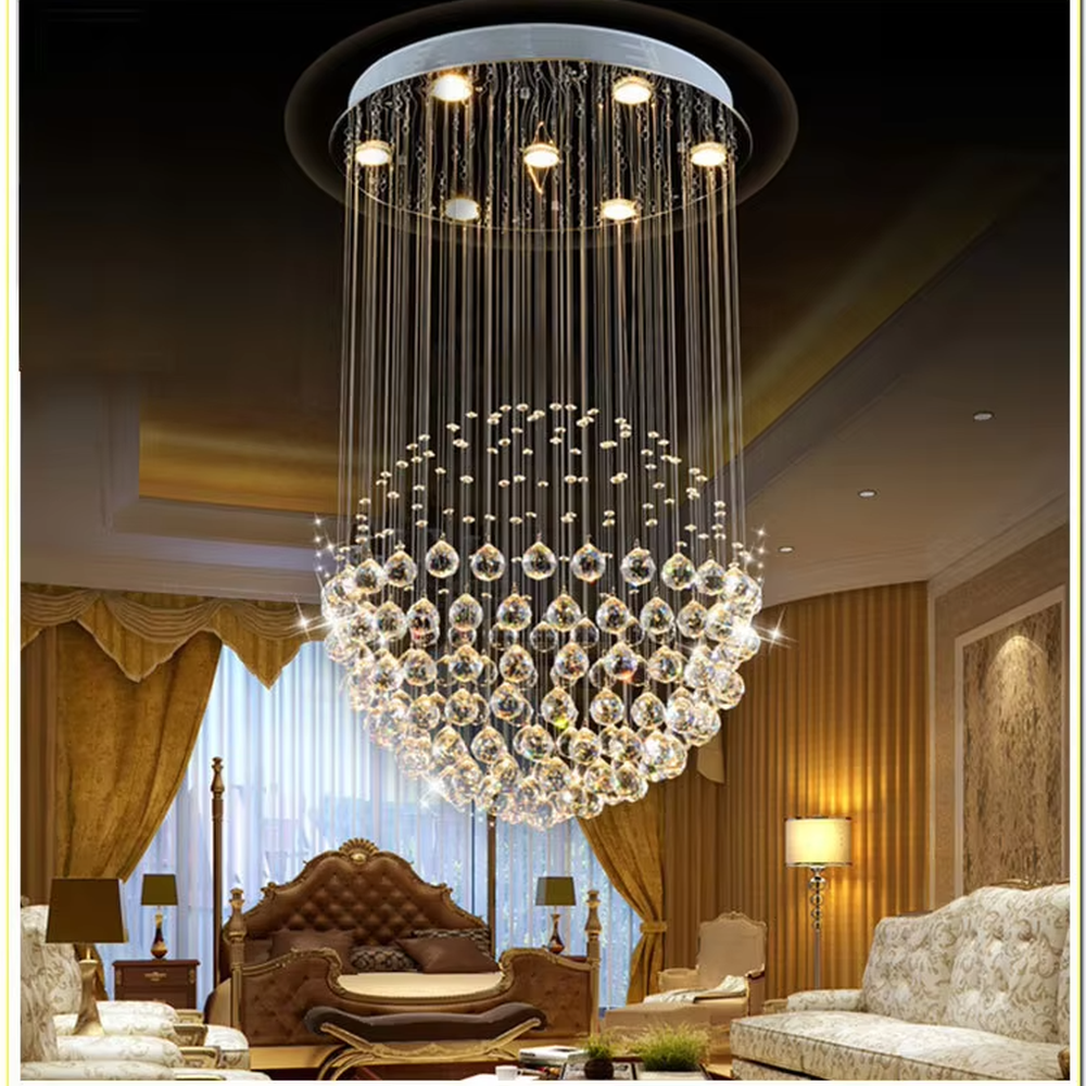 This light luxury crystal ball pendant chandelier features a circular metal base paired with metal wires and dense crystal balls, forming a full spherical shape, with dazzling light, serving both lighting and decorative purposes, suitable for high-end residential spaces such as high-ceiling living rooms and villas.