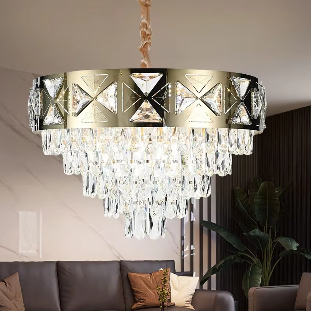 This is a luxurious round crystal chandelier, with a gold metal frame inlaid with cut crystal decorations, and cascading crystal strips hanging below, featuring brilliant and soft light, both decorative and lighting functions, ideal for high-end indoor spaces such as living rooms and dining rooms.