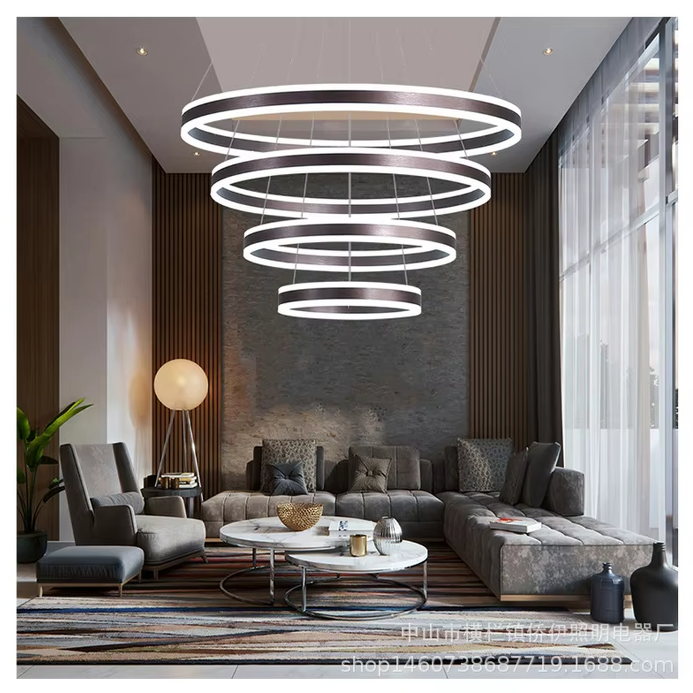 A modern light luxury three-tier ring LED chandelier, featuring a gold metal frame with built-in soft light strips and adjustable suspension rods for different ceiling heights, combining lighting and decorative functions, ideal for creating a minimalist and sophisticated space atmosphere.
