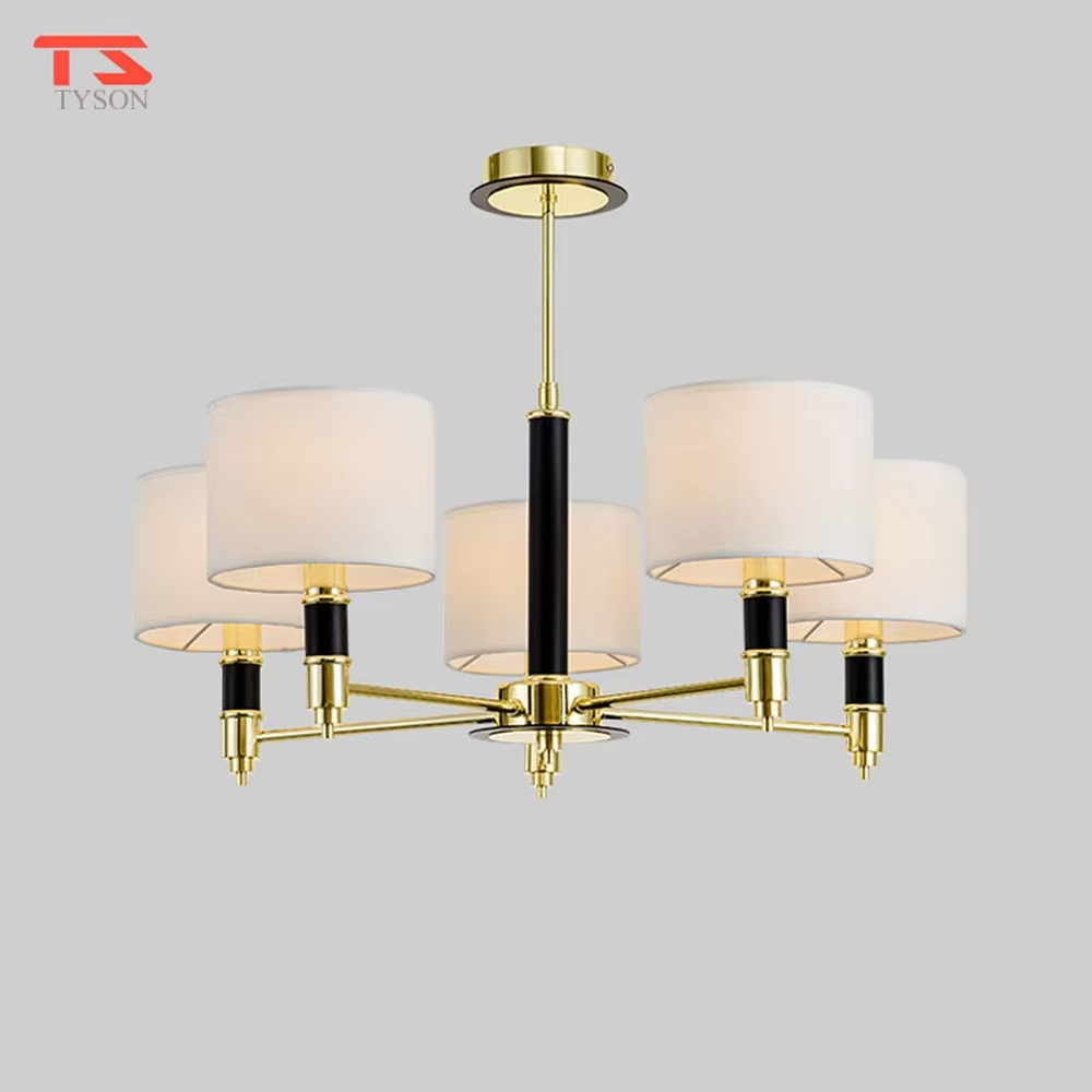 Modern light luxury black-gold contrasting chandelier, with a golden metal frame paired with black decorations and blue transparent glass lampshades, featuring a minimalist and elegant shape, combining decorative and lighting functions, suitable for living rooms, dining rooms, high-end clubs and other modern style spaces.