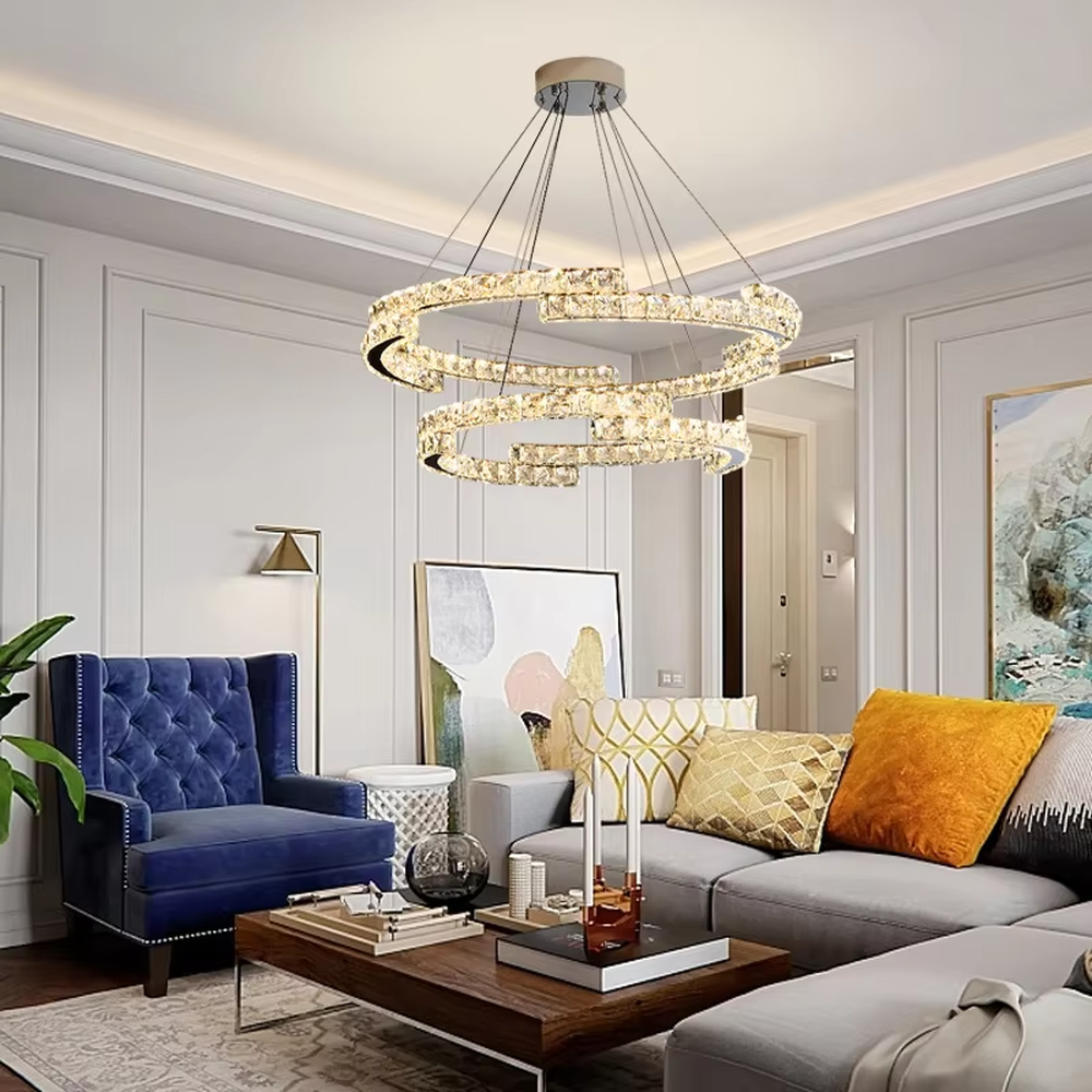 This is a luxurious large chandelier, supported by a gold metal frame with multi-layer crystal pendants, featuring a blooming and gorgeous shape, with brilliant and dazzling light, both decorative and lighting functions, ideal for large commercial spaces such as high-end restaurants and hotel lobbies.