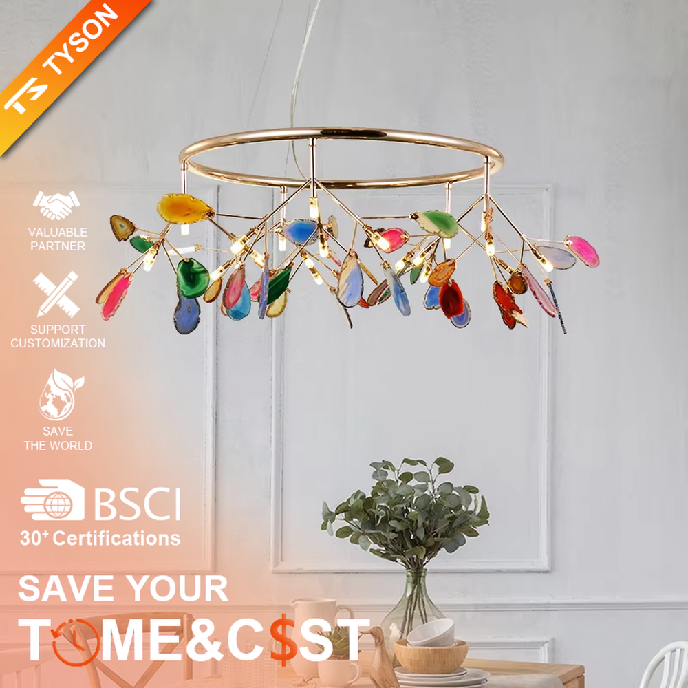 A modern art style linear chandelier, featuring a gold metal branch-like frame with suspended natural colorful agate slices. It emits soft and vibrant light when lit, combining artistic decoration with lighting functionality, ideal for creating a romantic and lively space atmosphere.
