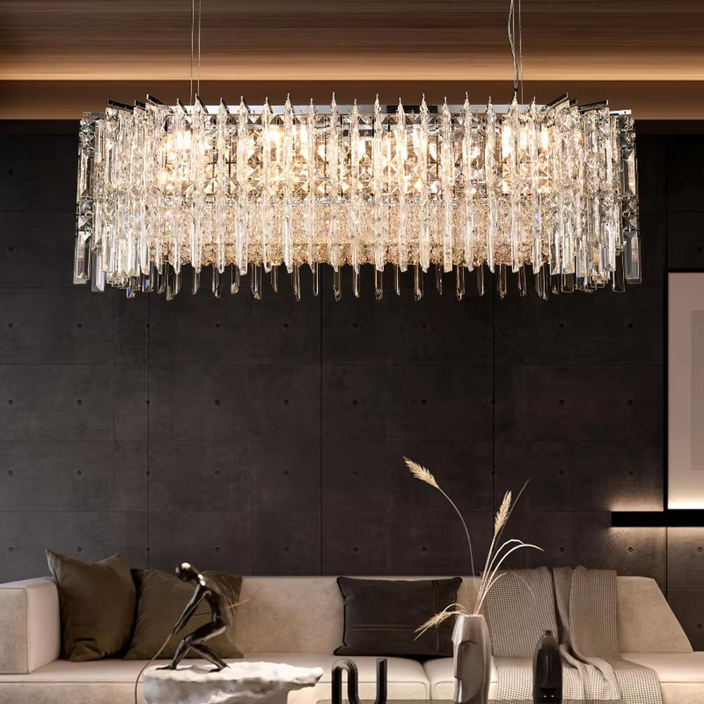 Modern light luxury rectangular multi-layer crystal chandelier, with a metal frame and layered transparent crystal strips, featuring bright and soft light, combining decorative and lighting functions, suitable for dining rooms, living rooms, high-end clubs and other modern style spaces.
