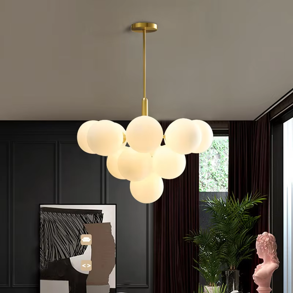 Modern light luxury cloud-shaped chandelier, with a golden metal frame and milky white frosted glass ball lampshades stacked into a full cloud shape, featuring soft and warm light, combining decorative and lighting functions, suitable for living rooms, dining rooms, bedrooms and other modern style spaces.