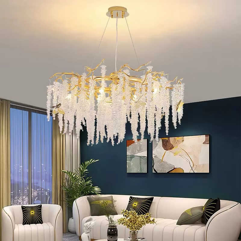 Modern light luxury long-strip vine-tassel crystal chandelier, with a gold branch-shaped metal frame paired with cascading crystal particles, emitting brilliant and soft light, combining artistic decorativeness and lighting function, suitable for core lighting and atmosphere creation in spaces such as dining rooms, bars, and light luxury living rooms.