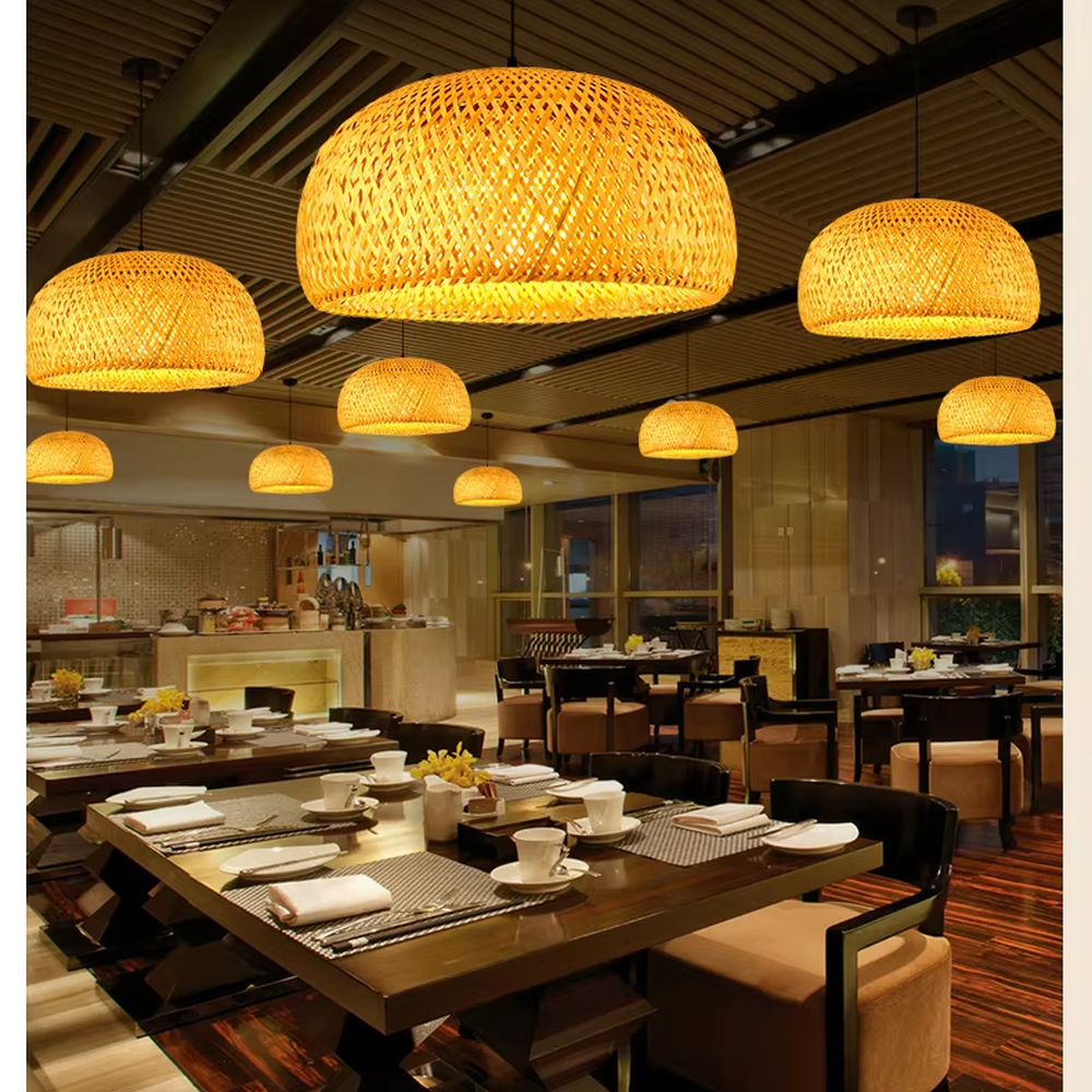 This new Chinese-style bamboo woven hemisphere chandelier is made of natural bamboo strips woven into a hollow hemisphere shape. Warm light refracts a soft halo through the bamboo texture, serving both lighting and decorative purposes, suitable for natural-style spaces such as restaurants and homestays.
