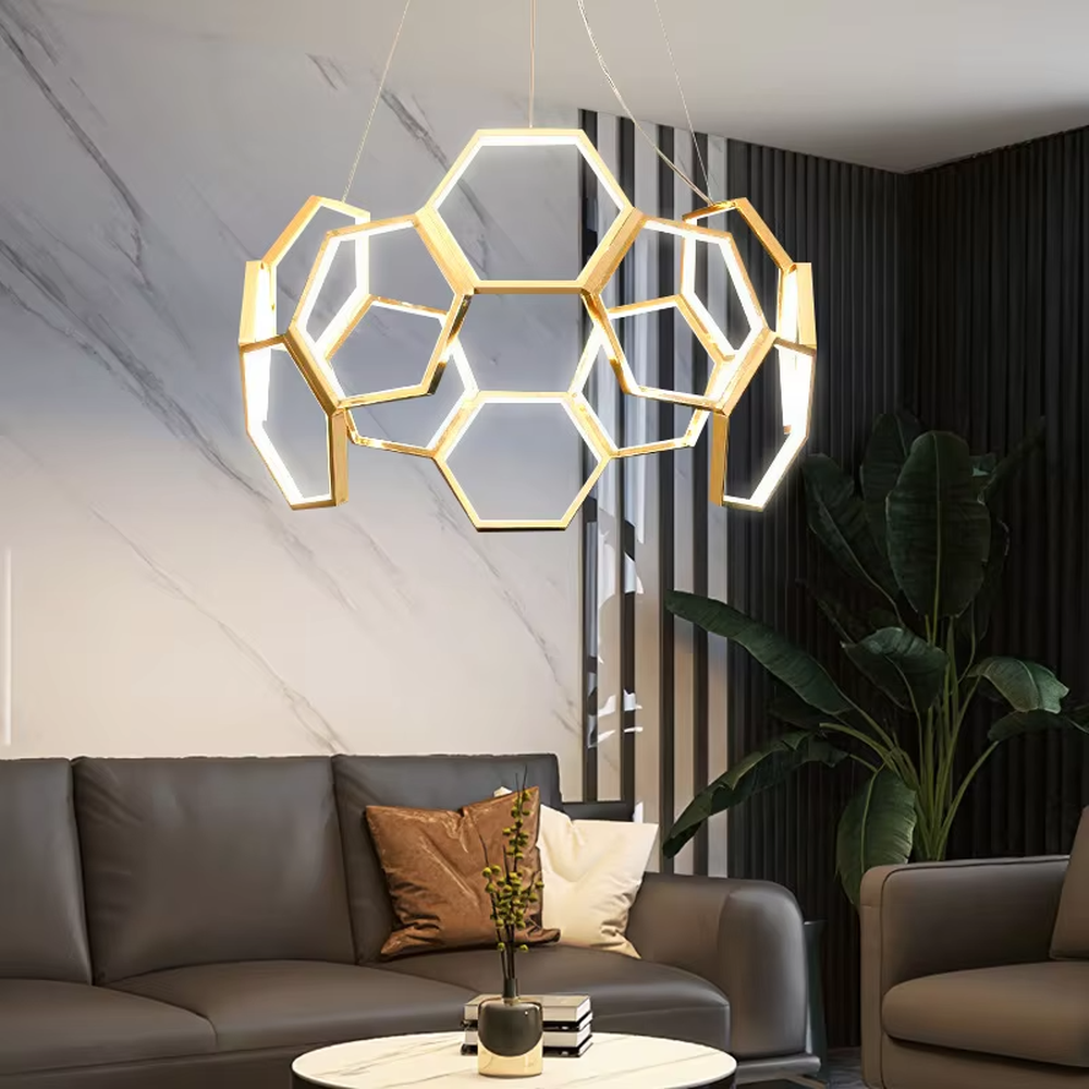 A modern light luxury style honeycomb-shaped chandelier, featuring a honeycomb geometric frame made of gold metal with built-in LED strips. It emits soft and uniform light when lit, combining artistic decoration with lighting functionality, ideal for creating a high-end and futuristic space atmosphere.
