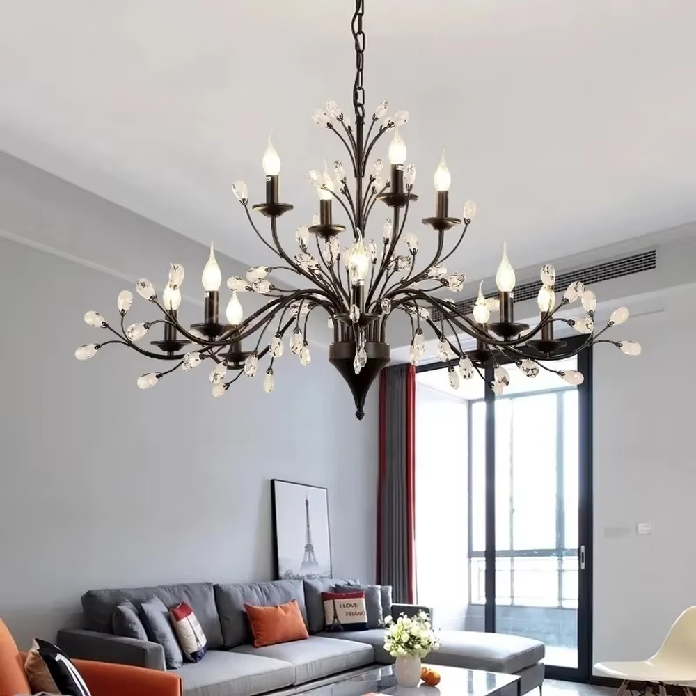 A modern light luxury and retro combined branch chandelier, featuring an extended multi-layer branch structure made of dark brown metal, adorned with crystal particles and candle-shaped bulbs. It emits a brilliant yet soft glow when lit, combining decorative appeal with practical illumination, ideal for creating a romantic and sophisticated space atmosphere.