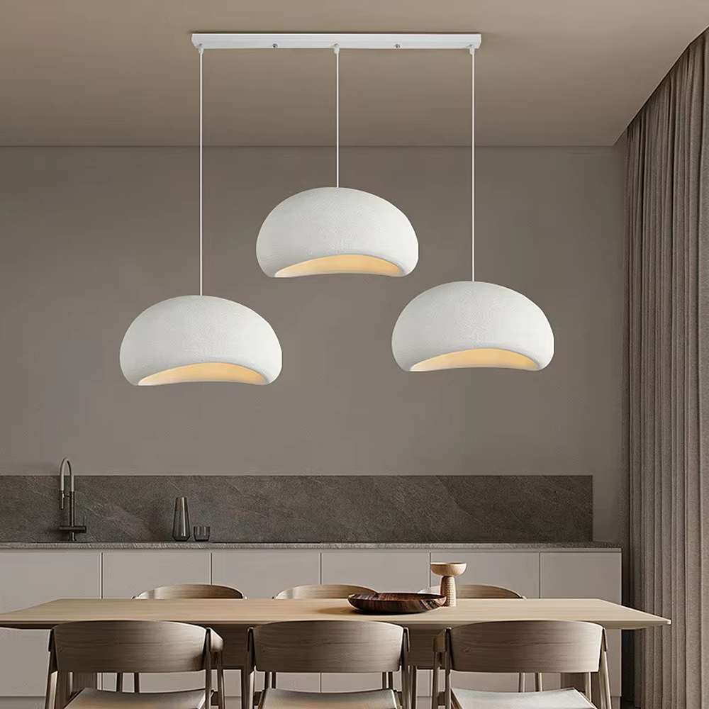 This is a wabi-sabi style hemispherical chandelier, crafted from a textured gray cement-like material, emitting soft warm light from its edge, serving both lighting and decorative purposes, suitable for wabi-sabi style dining rooms, Japanese tea rooms, minimalist living rooms, homestay guest rooms and other scenarios pursuing a relaxed feeling.